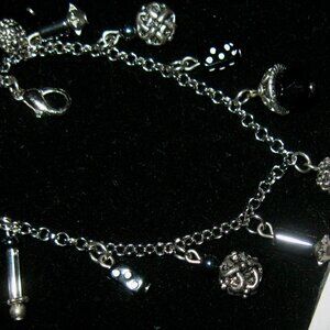 "MADE IN USA ASSRTD GLASS BEADS & DANGLING FINDINGS W/LOBSTER CLASP BRACELET"